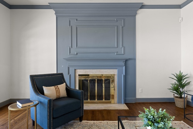 1116 Cumberland Rd, Chattanooga, TN 37419 - sitting room featuring wood finished floors, ornamental molding, and a fireplace