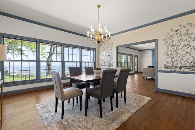 1116 Cumberland Rd, Chattanooga, TN 37419 - dining room featuring ornamental molding, a chandelier, and wood finished floors