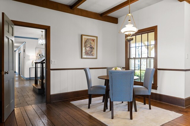 1116 Cumberland Rd, Chattanooga, TN 37419 - dining area featuring hardwood / wood-style flooring, beam ceiling, a chandelier, and wainscoting
