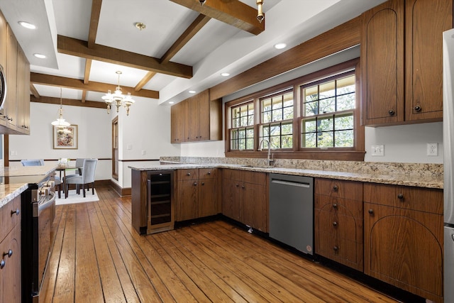 1116 Cumberland Rd, Chattanooga, TN 37419 - kitchen with appliances with stainless steel finishes, wine cooler, beamed ceiling, dark wood-style floors, and a chandelier