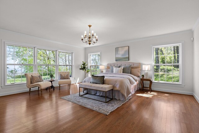 1116 Cumberland Rd, Chattanooga, TN 37419 - bedroom with a chandelier, hardwood / wood-style floors, and crown molding