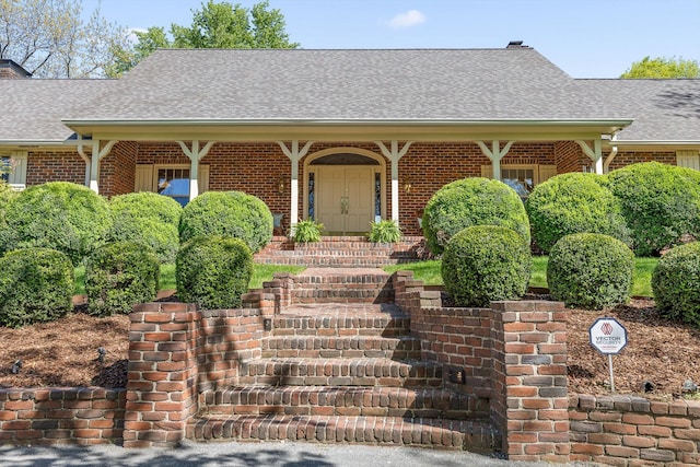 1116 Cumberland Rd, Chattanooga, TN 37419 - view of front of home featuring brick siding and roof with shingles