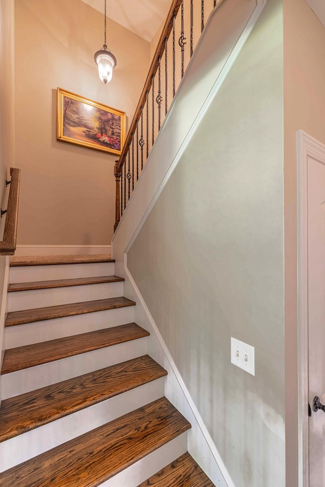 staircase with baseboards