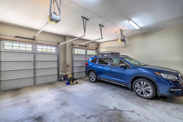 garage featuring a garage door opener