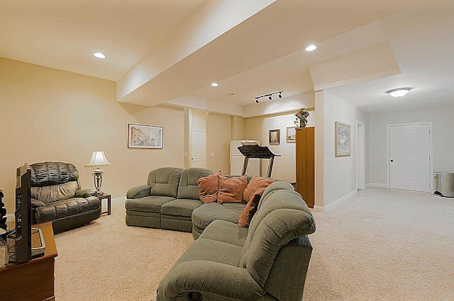 living area featuring light carpet, baseboards, and recessed lighting
