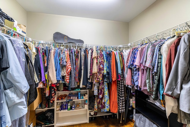 spacious closet with wood finished floors