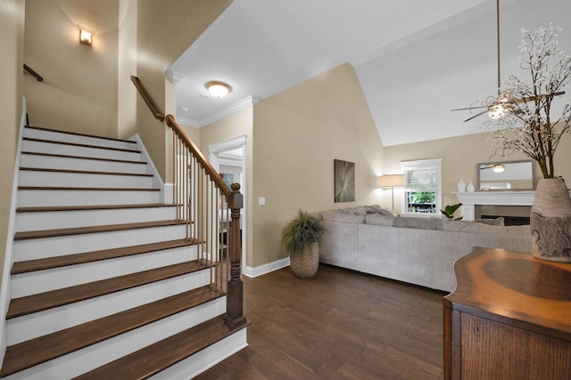 7310 Huntley Ln, Chattanooga, TN 37421 - stairs featuring wood finished floors, ceiling fan, a fireplace, and lofted ceiling