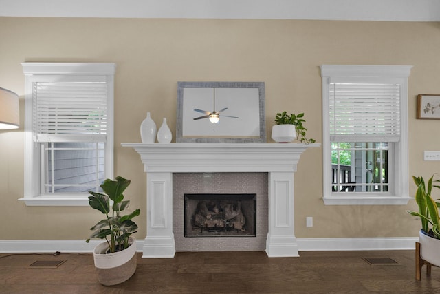 7310 Huntley Ln, Chattanooga, TN 37421 - living room with a ceiling fan, a tile fireplace, and wood finished floors