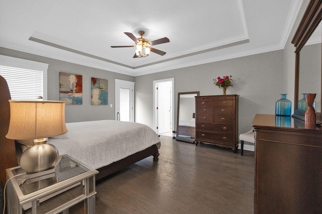 7310 Huntley Ln, Chattanooga, TN 37421 - bedroom with a tray ceiling, dark wood finished floors, crown molding, and a ceiling fan
