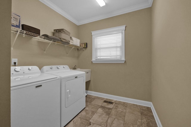 7310 Huntley Ln, Chattanooga, TN 37421 - laundry area with washing machine and clothes dryer and ornamental molding