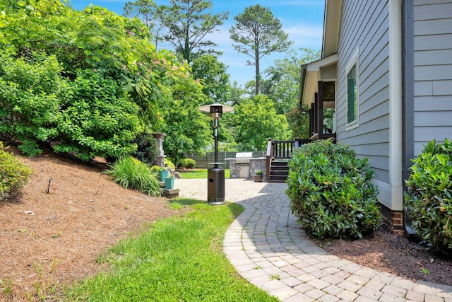 7310 Huntley Ln, Chattanooga, TN 37421 - view of yard with a wooden deck and a patio area