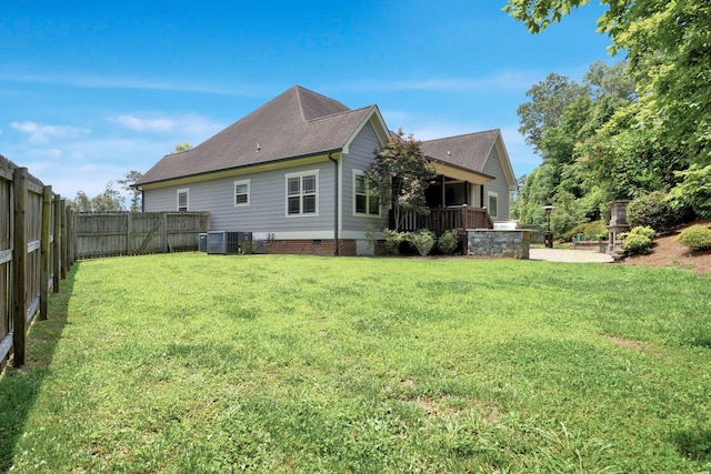 7310 Huntley Ln, Chattanooga, TN 37421 - back of house featuring a fenced backyard and roof with shingles
