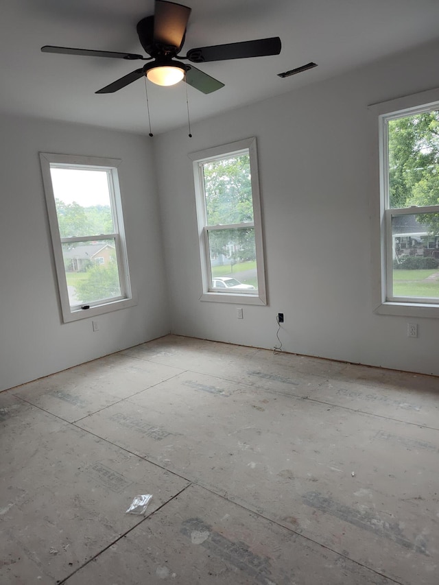 410 Cherry St, Dunlap, TN 37327 - unfurnished room featuring healthy amount of natural light and a ceiling fan
