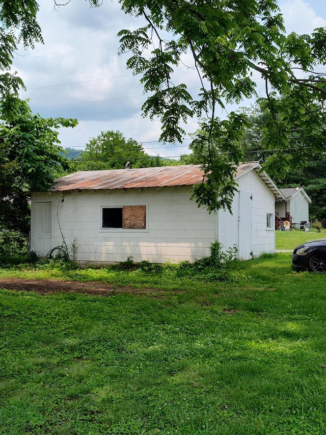 410 Cherry St, Dunlap, TN 37327 - view of home's exterior with a lawn