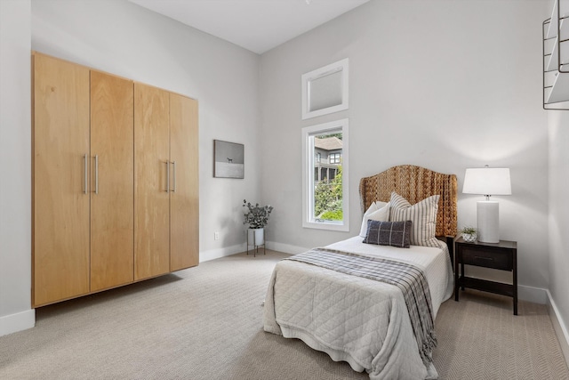623 Hamilton Ave, Chattanooga, TN 37405 - bedroom featuring light carpet and baseboards