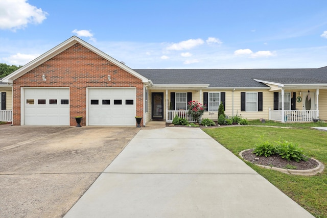 548 Flagstone Dr, Rossville, GA 30741 - view of front facade featuring a porch, an attached garage, concrete driveway, a front lawn, and brick siding