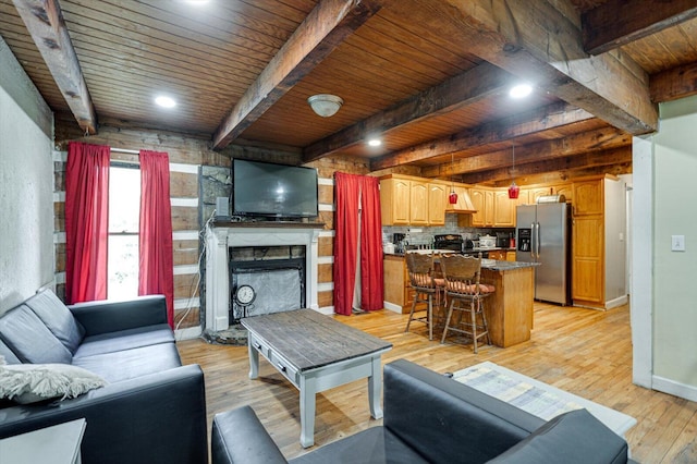 241 Bryant Ln, Tracy City, TN 37387 - living area featuring beam ceiling, light wood-style flooring, wooden ceiling, a fireplace, and recessed lighting