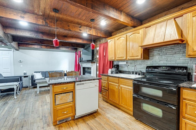 241 Bryant Ln, Tracy City, TN 37387 - kitchen with dishwasher, range with two ovens, a sink, light wood-type flooring, and decorative backsplash