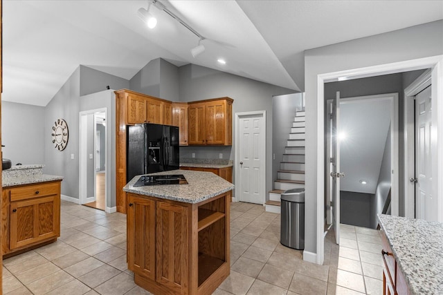 125 Robbie Dr, Whitwell, TN 37397 - kitchen with black appliances, lofted ceiling, light tile patterned floors, track lighting, and open shelves