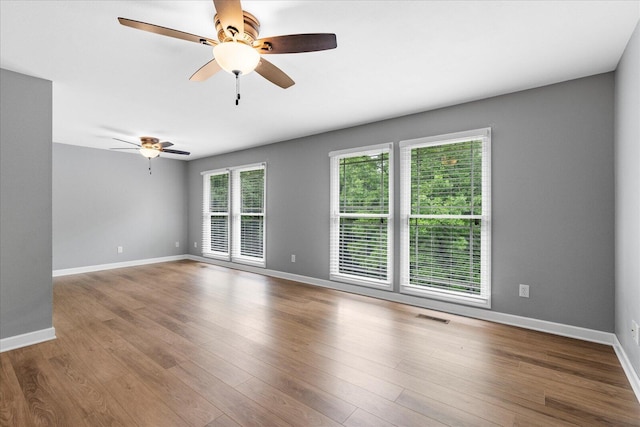 125 Robbie Dr, Whitwell, TN 37397 - spare room featuring a ceiling fan, baseboards, and wood finished floors