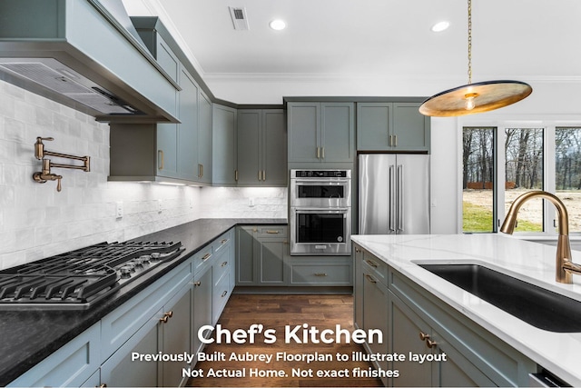4850 Amethyst Rd Unit 904, Chattanooga, TN 37419 - kitchen with appliances with stainless steel finishes, a sink, ornamental molding, light stone counters, and tasteful backsplash
