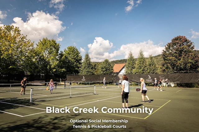 4850 Amethyst Rd Unit 904, Chattanooga, TN 37419 - view of tennis court with community basketball court and fence