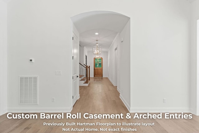 3070 Galena Cir Unit 830, Chattanooga, TN 37419 - hallway featuring wood finished floors, arched walkways, baseboards, and stairs