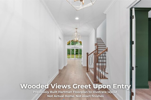 3070 Galena Cir Unit 830, Chattanooga, TN 37419 - corridor featuring a chandelier, wood finished floors, stairway, ornamental molding, and baseboards