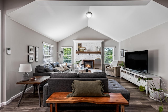 818 Dunlap Ave, Chattanooga, TN 37412 - living room with dark wood-style floors, vaulted ceiling, a fireplace, and baseboards