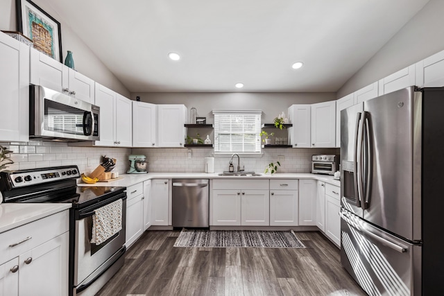 818 Dunlap Ave, Chattanooga, TN 37412 - kitchen with appliances with stainless steel finishes, a sink, open shelves, lofted ceiling, and light countertops