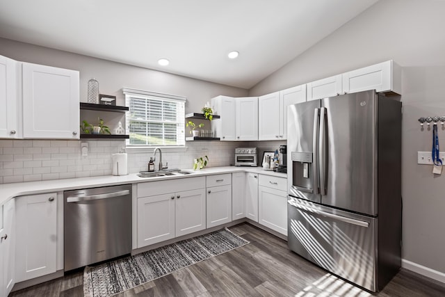 818 Dunlap Ave, Chattanooga, TN 37412 - kitchen featuring stainless steel appliances, open shelves, a sink, backsplash, and dark wood finished floors