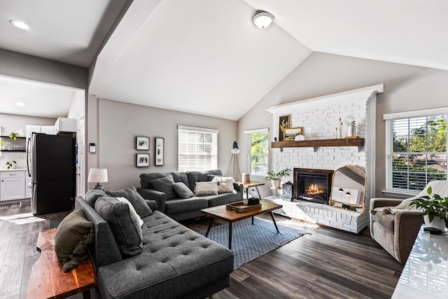 818 Dunlap Ave, Chattanooga, TN 37412 - living room with dark wood finished floors, lofted ceiling, a fireplace, and recessed lighting