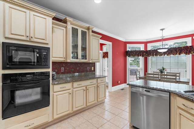 kitchen featuring black appliances, cream cabinets, light tile patterned floors, and ornamental molding