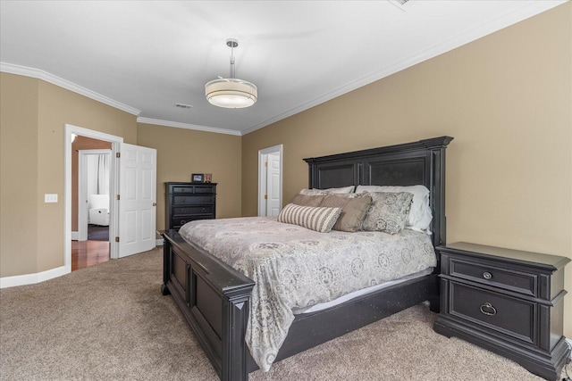 bedroom featuring carpet flooring, ornamental molding, and baseboards