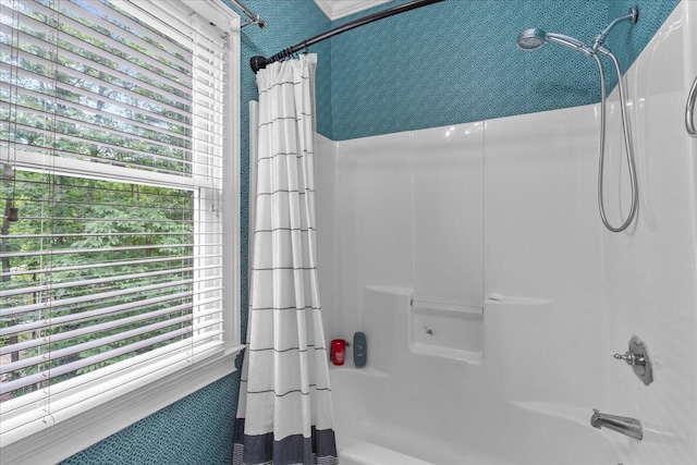 bathroom with shower / bath combination with curtain