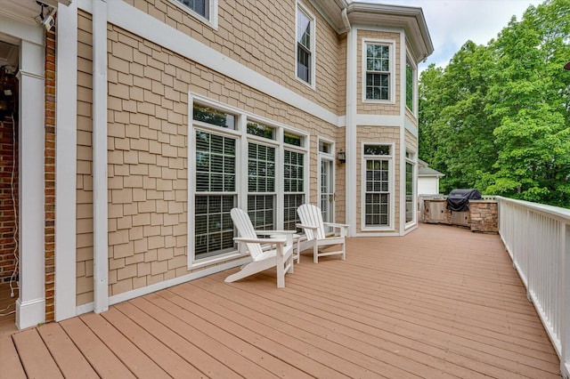 wooden deck featuring grilling area