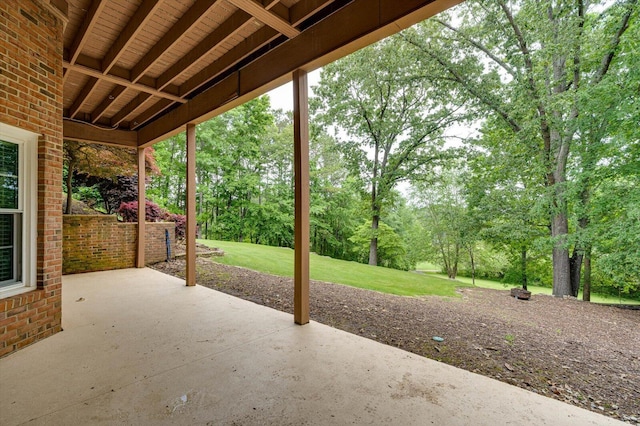 view of patio / terrace featuring view of scattered trees