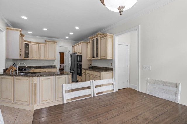 353 Golf View Dr, Cohutta, GA 30710 - kitchen with a sink, black appliances, cream cabinetry, ornamental molding, and glass insert cabinets