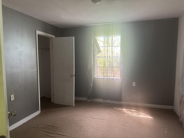 111 Arlington Ter, Chattanooga, TN 37410 - unfurnished bedroom with carpet, baseboards, and a closet
