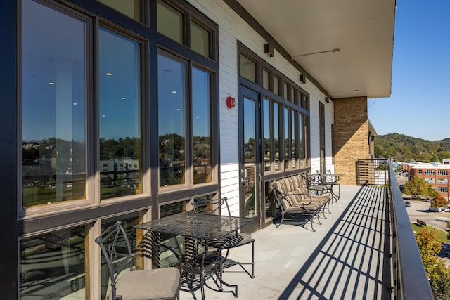 200 Manufacturers Rd Apt 339, Chattanooga, TN 37405 - view of patio featuring a balcony and a mountain view