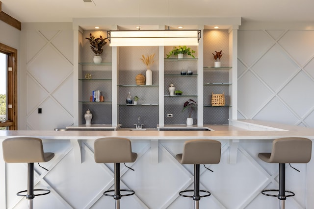 200 Manufacturers Rd Apt 339, Chattanooga, TN 37405 - indoor wet bar with a decorative wall and built in shelves