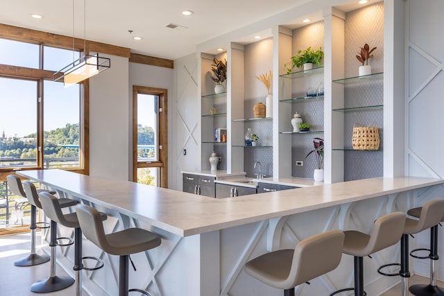 200 Manufacturers Rd Apt 339, Chattanooga, TN 37405 - kitchen with light countertops, open shelves, a sink, hanging light fixtures, and recessed lighting