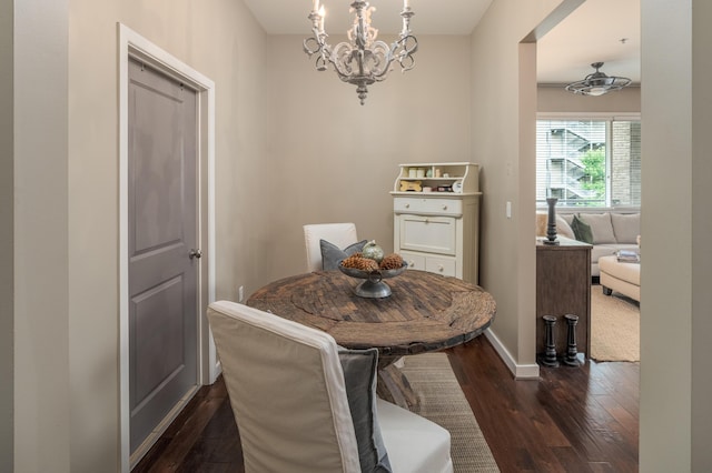 200 Manufacturers Rd Apt 339, Chattanooga, TN 37405 - dining space with dark wood-style floors, a chandelier, and baseboards