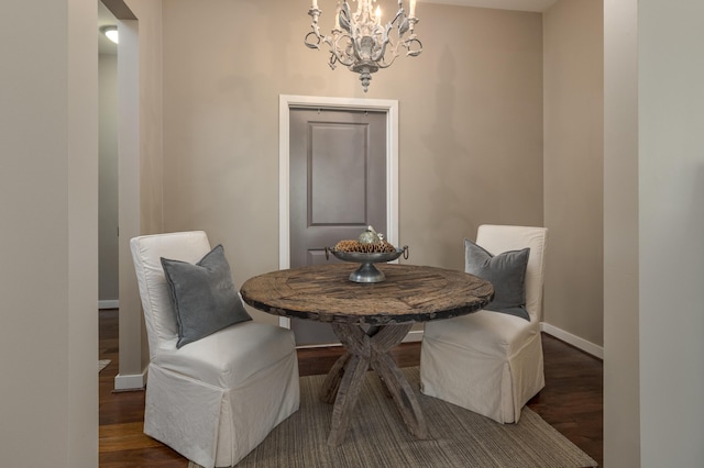 200 Manufacturers Rd Apt 339, Chattanooga, TN 37405 - dining room featuring a chandelier, wood finished floors, and baseboards