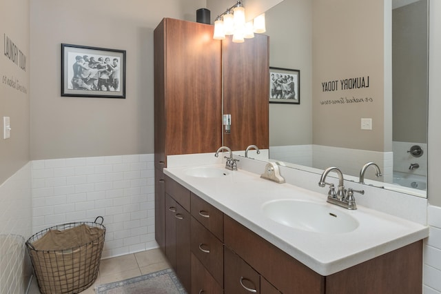 200 Manufacturers Rd Apt 339, Chattanooga, TN 37405 - full bathroom with double vanity, tile walls, and tile patterned flooring
