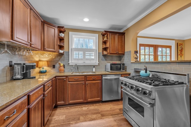 122 Hilltop Dr, Chattanooga, TN 37411 - kitchen featuring appliances with stainless steel finishes, open shelves, a sink, brown cabinets, and crown molding