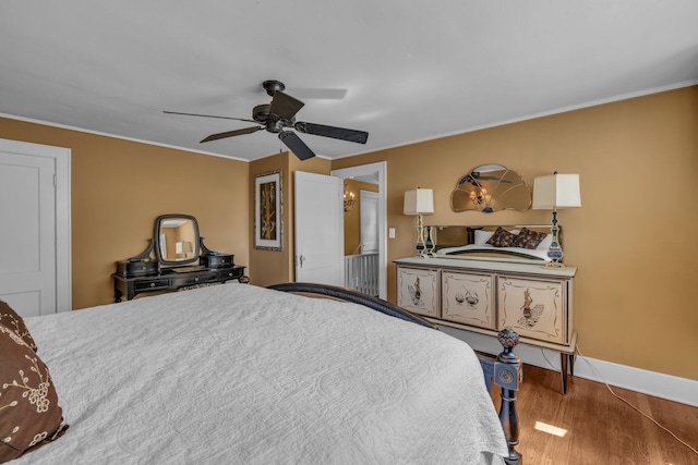 122 Hilltop Dr, Chattanooga, TN 37411 - bedroom featuring crown molding, wood finished floors, baseboards, and a ceiling fan