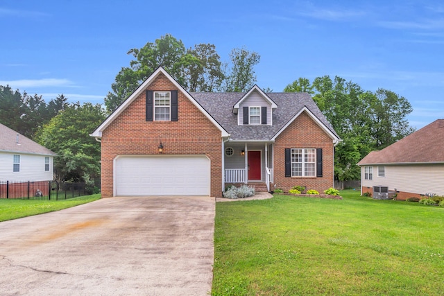 8369 Shadetree Ln, Ooltewah, TN 37363 - traditional-style house with brick siding, concrete driveway, central AC, a porch, and a shingled roof