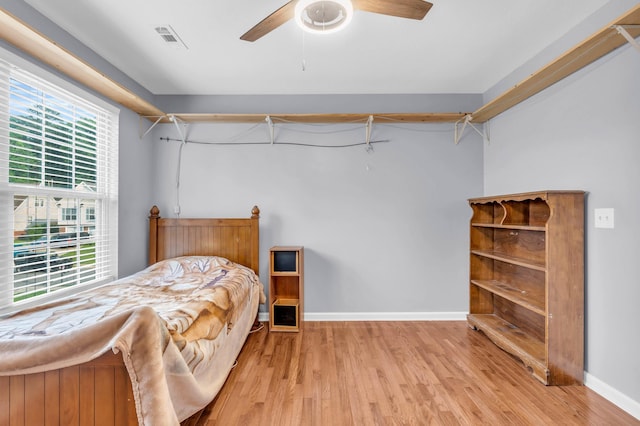 8369 Shadetree Ln, Ooltewah, TN 37363 - bedroom with wood finished floors, baseboards, and ceiling fan