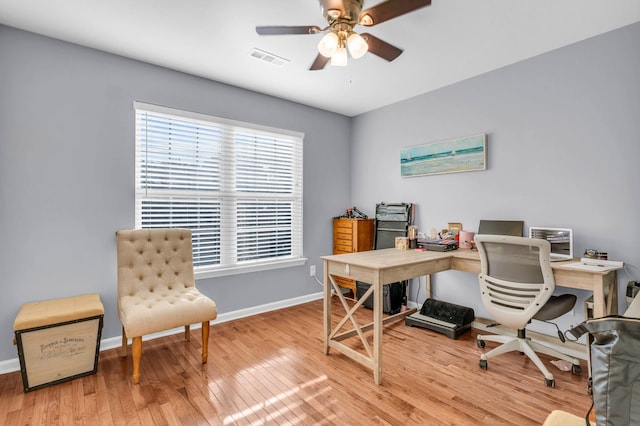 8369 Shadetree Ln, Ooltewah, TN 37363 - home office featuring baseboards, a ceiling fan, and wood finished floors
